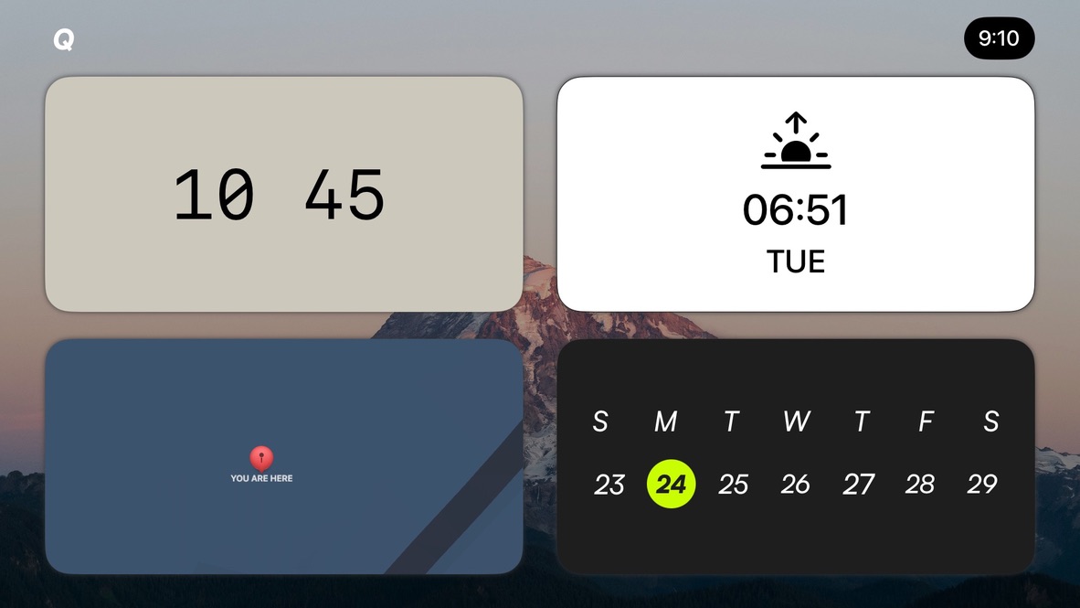 Time, sunrise, location, and calendar widgets over a mountain wallpaper